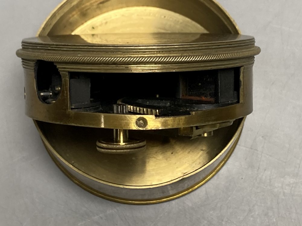 A Victorian brass pocket sextant by Watkins, Charring Cross, London, leather cased